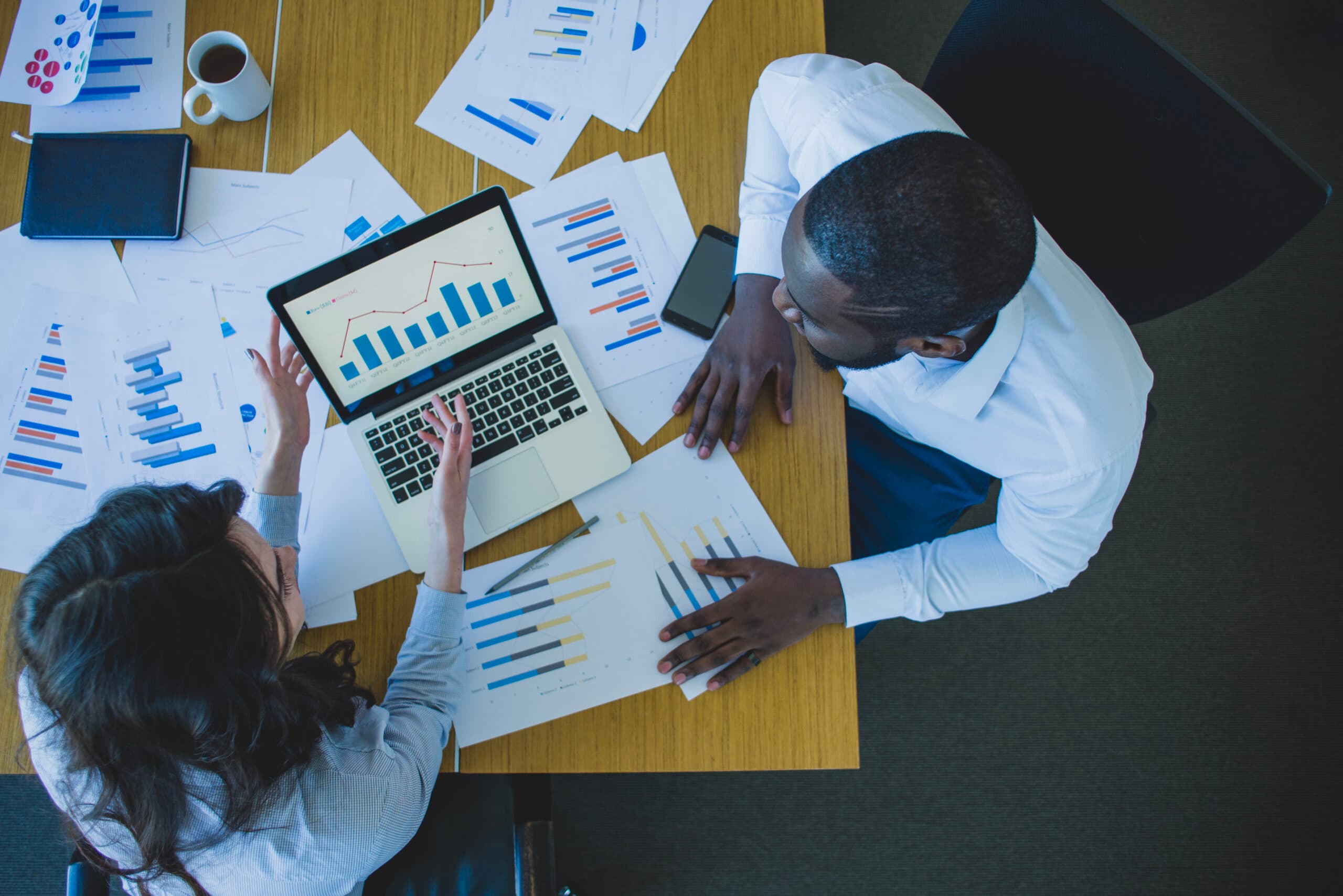 A picture showing hr analyzing workforce data