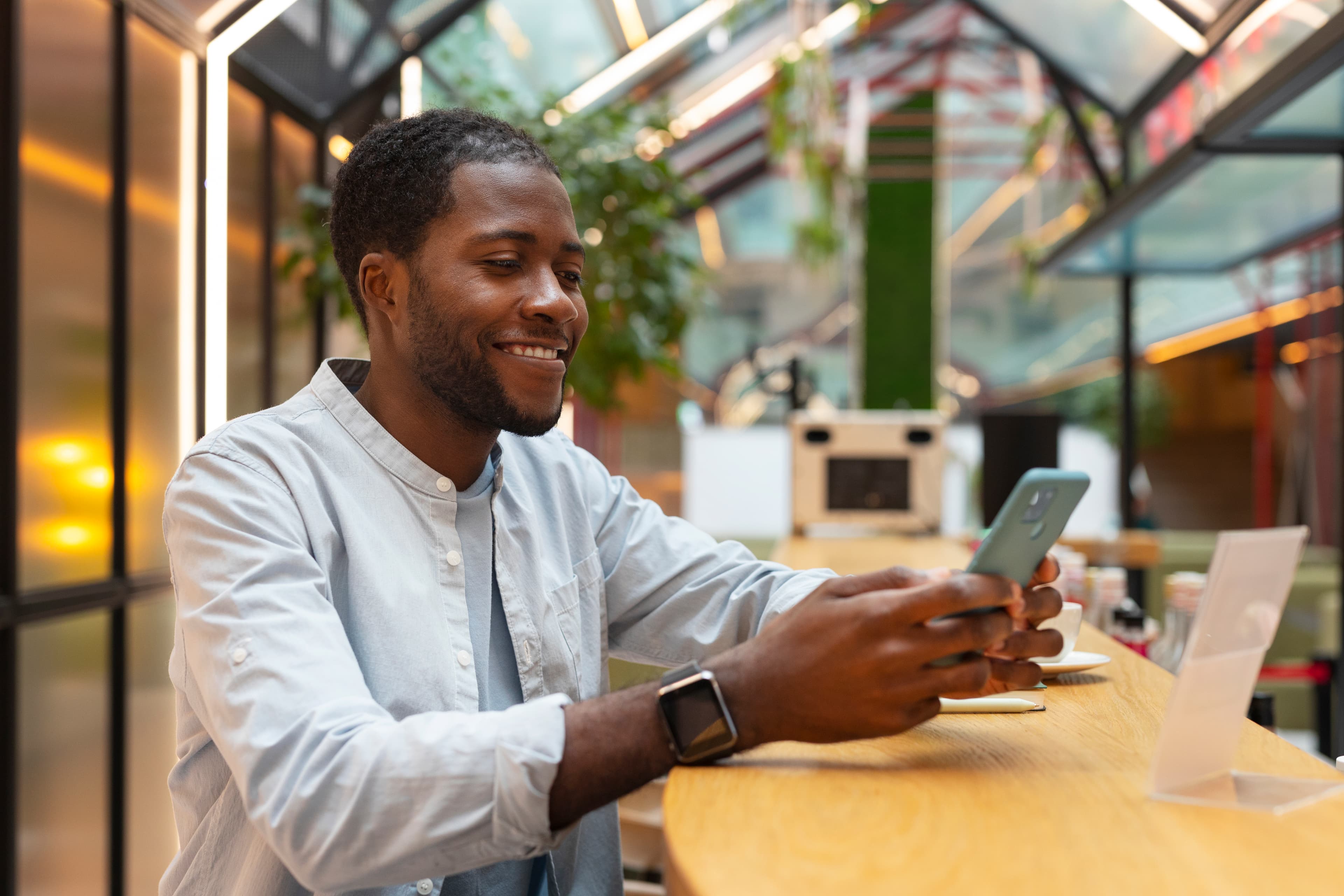 a man using his phone - employee self-service software - BizEdge blog