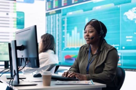 a woman verifying company data on her screen - cloud-based payroll systems - BizEdge blog