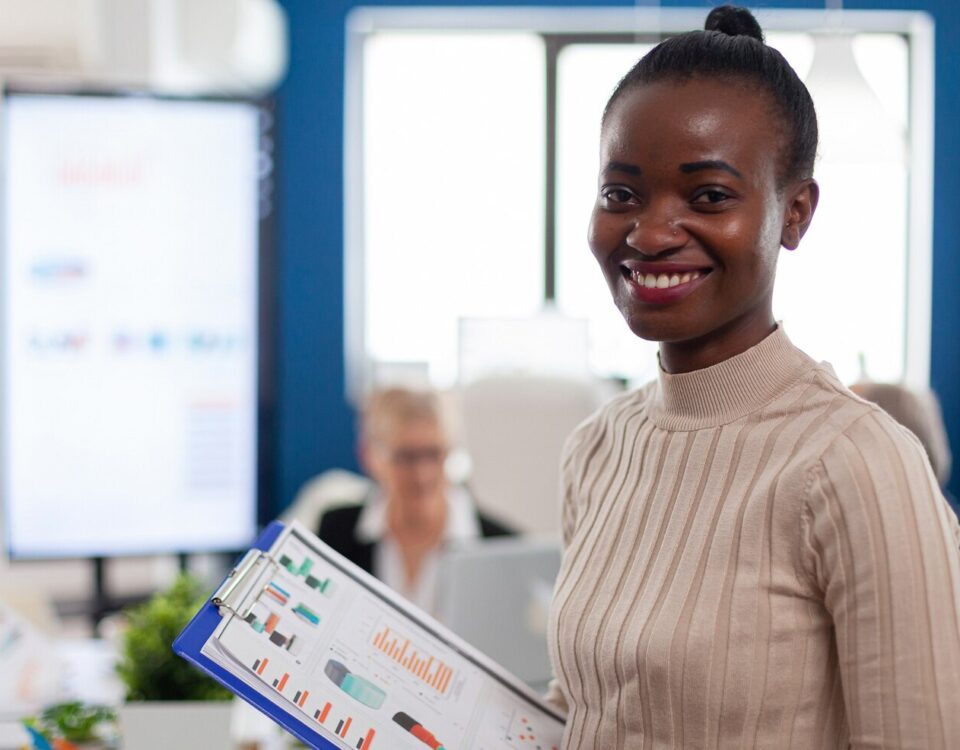 A smiling employee. Implementing a 360 feedback in your organisation performance review. Best way to review your employees performance.