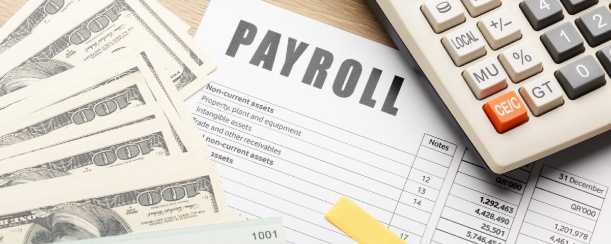 A picture of a paper with payroll written on it - BizEdge blog - The Impact of Payroll Mistakes on Your Business