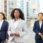 A picture of 3 women walking - BizEdge Blog - Setting Up an HR Department: Everything You Need to Know