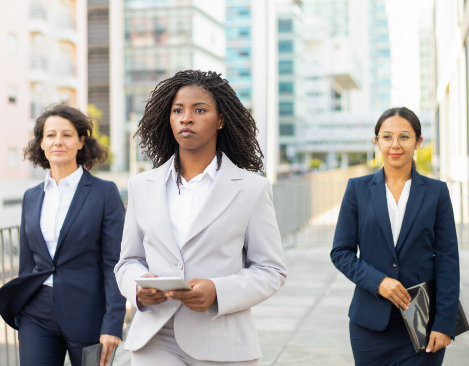 A picture of 3 women walking - BizEdge Blog - Setting Up an HR Department: Everything You Need to Know