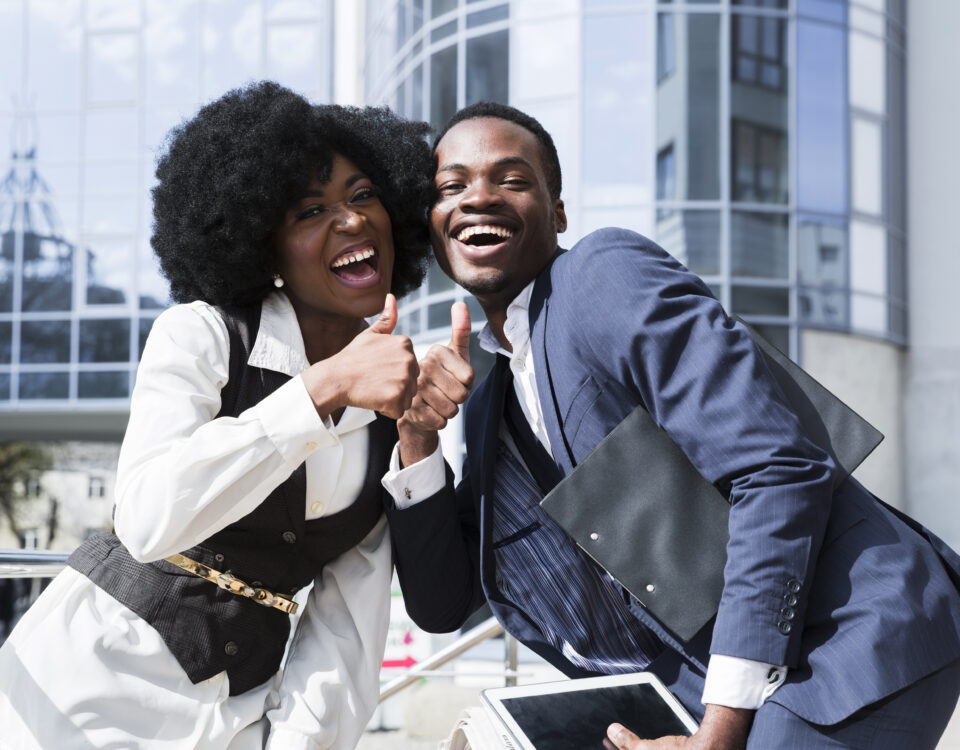Two happy employees-How to Create Fair and Efficient Shift Schedules for Your Team - BizEdge blog