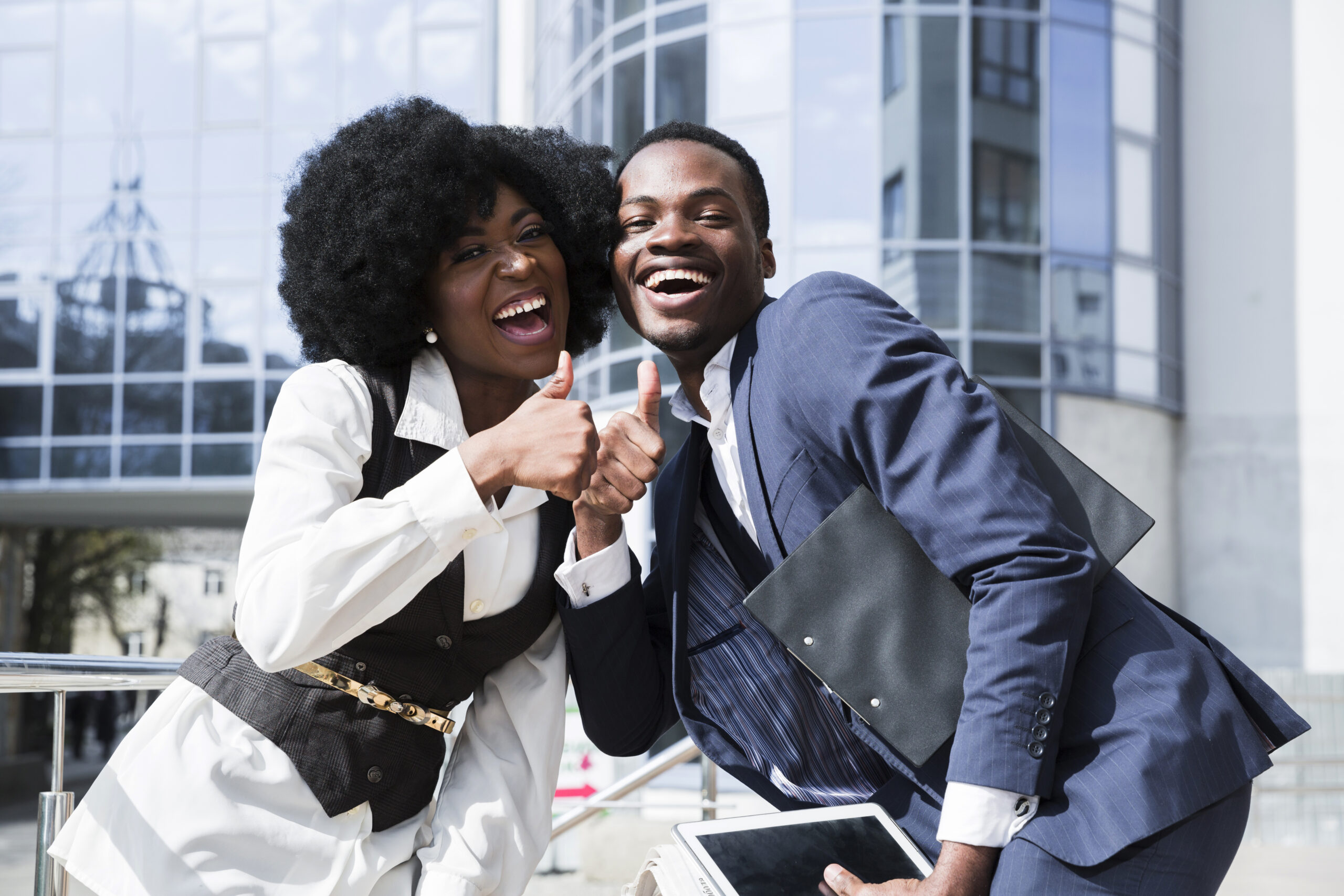 Two happy employees-How to Create Fair and Efficient Shift Schedules for Your Team - BizEdge blog