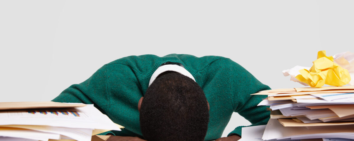 A picture of a stressed employee - How to Avoid Last Minute Call-Offs - BizEdge blog