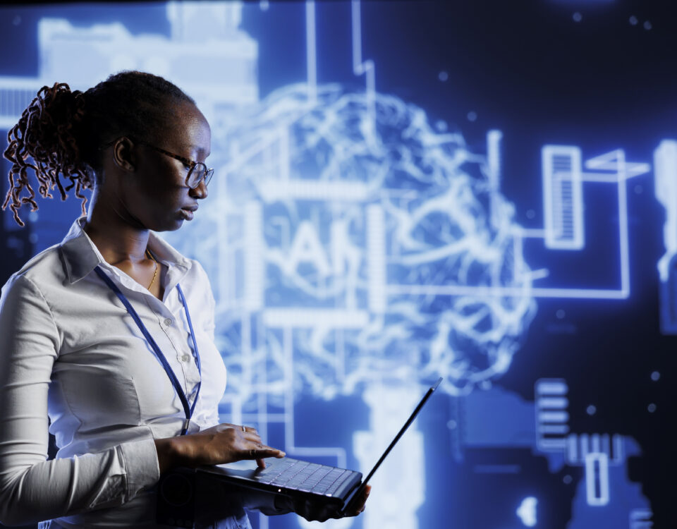 A picture of a lady using her system - The Role of AI in Modern HR: What Businesses Need to Know - BizEdge blog