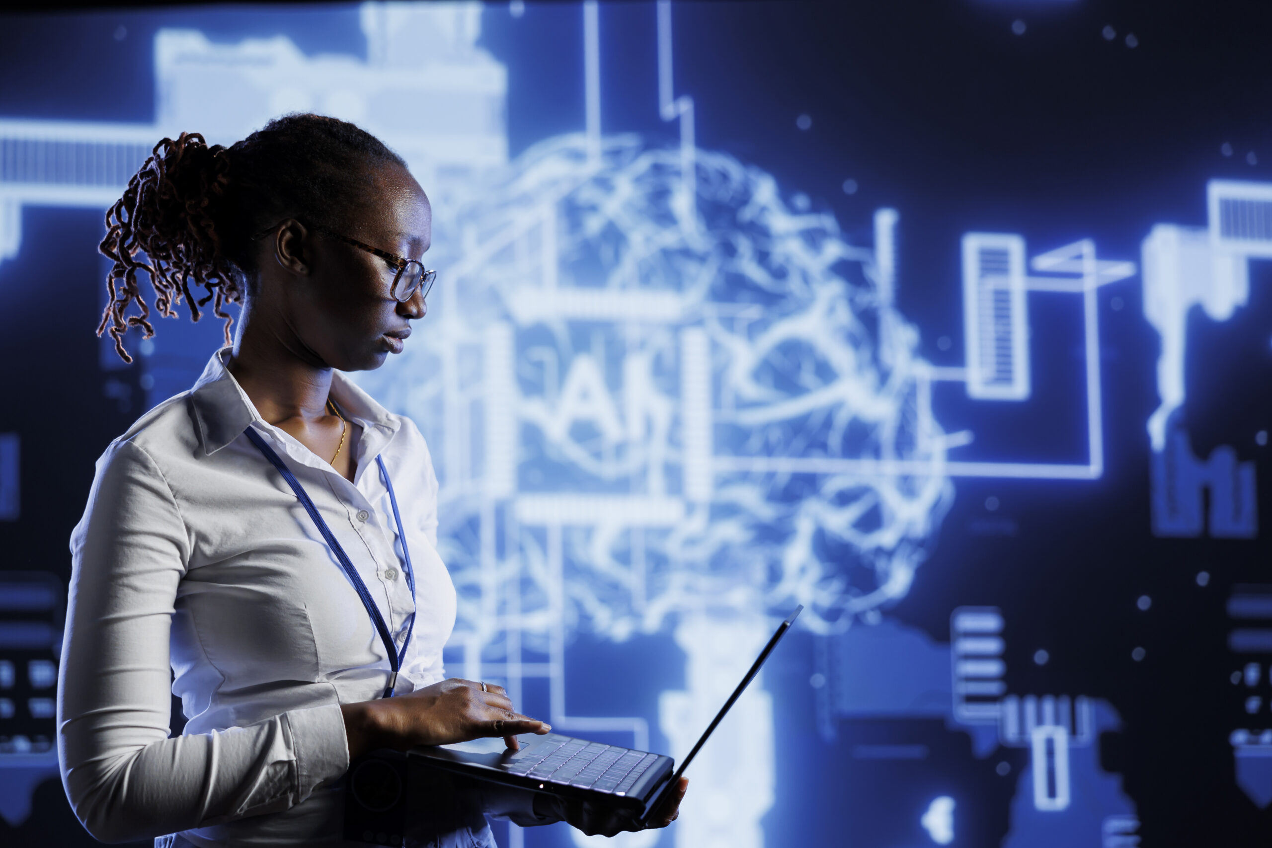 A picture of a lady using her system - The Role of AI in Modern HR: What Businesses Need to Know - BizEdge blog