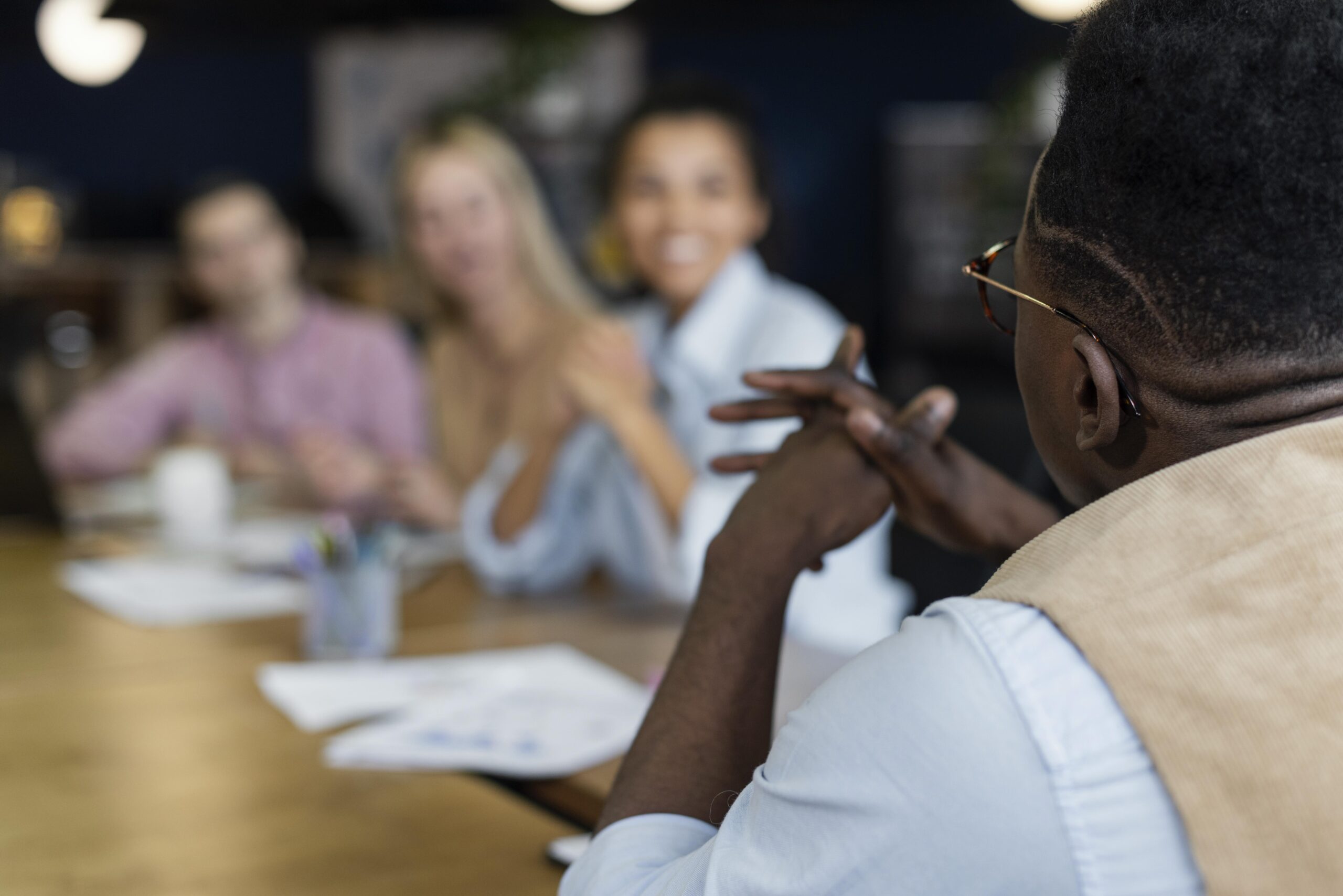 a picture of a group of people in a meetings - Reasons Why Town Halls Meetings Are Important - BizEdge blog