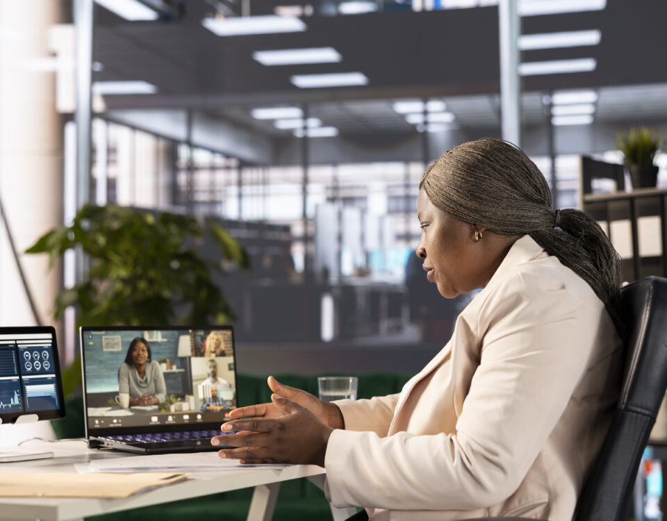 A woman on a video call on her system - why digital transformation in hr is important - BizEdge blog