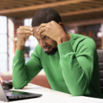 Man overwhelmed with work - poor rota plannning - BizEdge blog