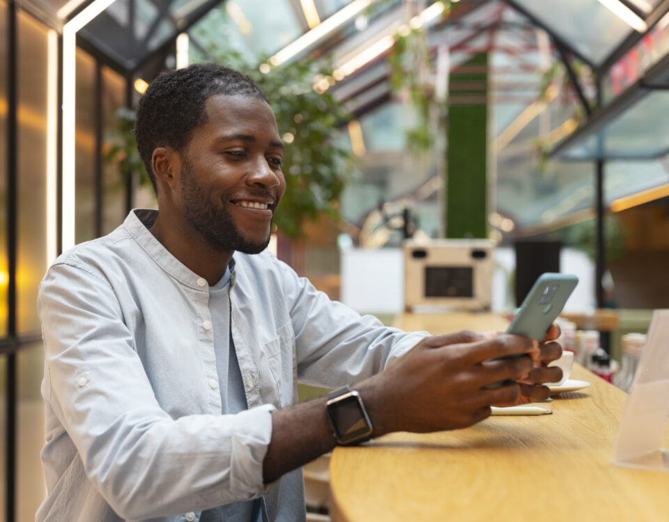 a man using his phone - employee self-service software - BizEdge blog