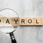 payroll concept with wooden cubes - payroll software - BizEdge blog