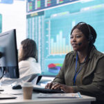 a woman verifying company data on her screen - cloud-based payroll systems - BizEdge blog