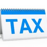 A calendar that has the word tax written on it - New PAYE Tax Law in Nigeria - BizEge blog