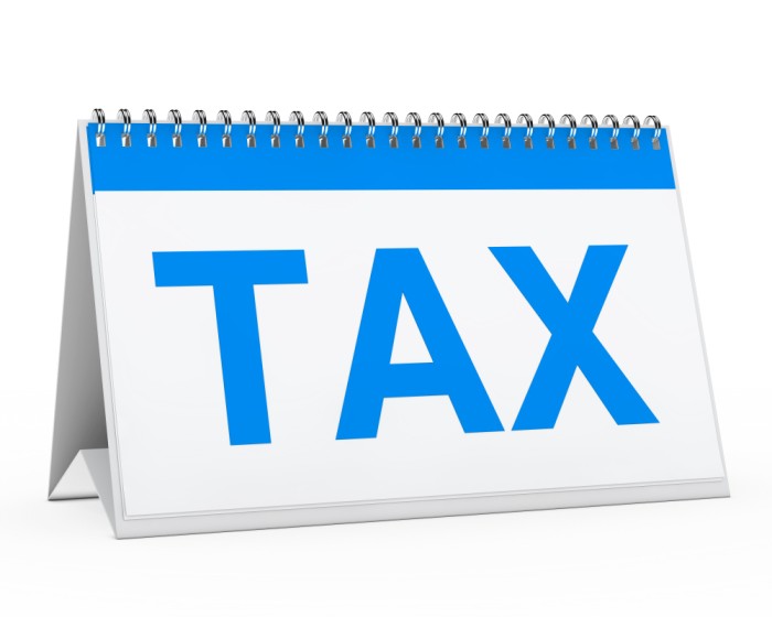 A calendar that has the word tax written on it - New PAYE Tax Law in Nigeria - BizEge blog
