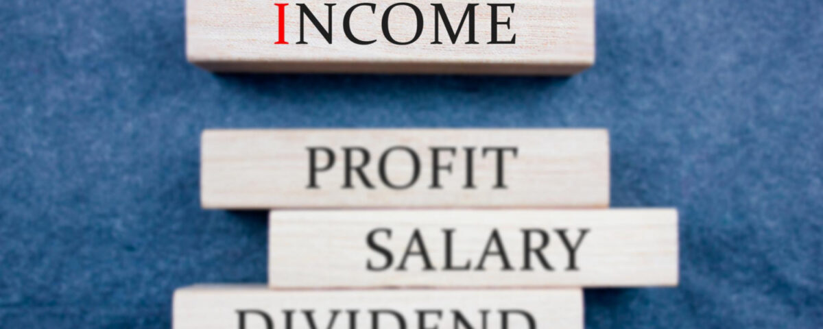 a jenga stick wood that has the word income, profit, salary and dividend written on it - salary structure - BizEdge blog