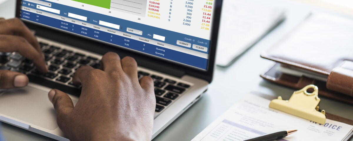 a man using his computer at his desk - HR - BizEdge blog