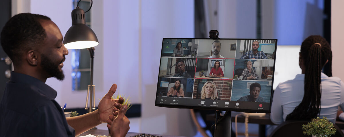 ofice worker attending a business meeting via video call - Remote hiring compliance in Africa - BizEdge blog