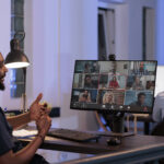 ofice worker attending a business meeting via video call - Remote hiring compliance in Africa - BizEdge blog