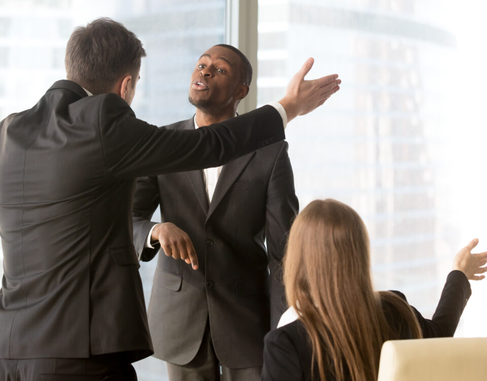 annoyed team members arguing - employee misconduct - BizEdge blog