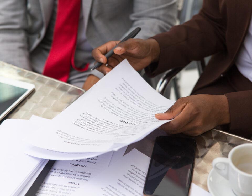 business man assessing records - employer of record - BizEdge blog