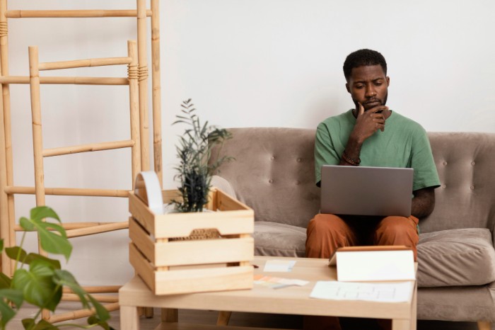 a man working at home - employee benefits - BizEdge blog