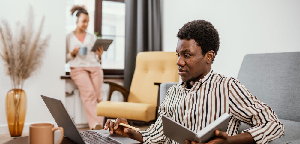 a man working at home - employee benefits - BizEdge blog