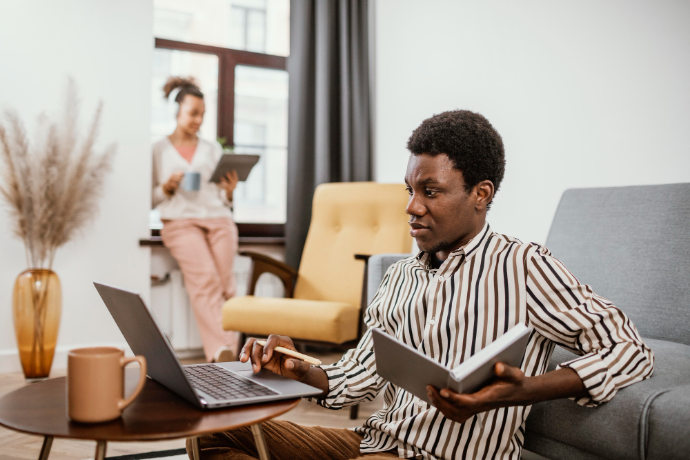 a man working at home - employee benefits - BizEdge blog