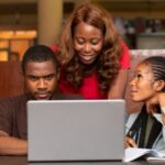 a group of people working together - on-the-job-training - BIzEdge blog