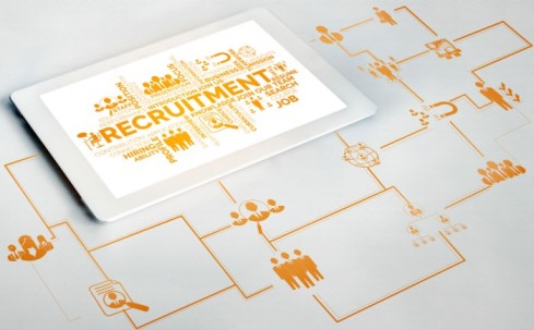 Recruitment on a tab with human networking at the background - Applicant Tracking Software