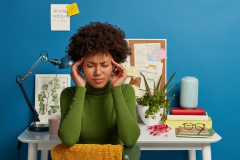 Upset woman who feels overworked - mental health - BizEdge blog