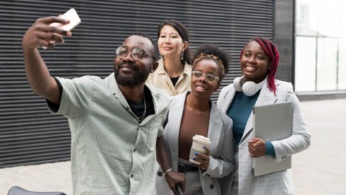 a group of people playing - Gen Z employees